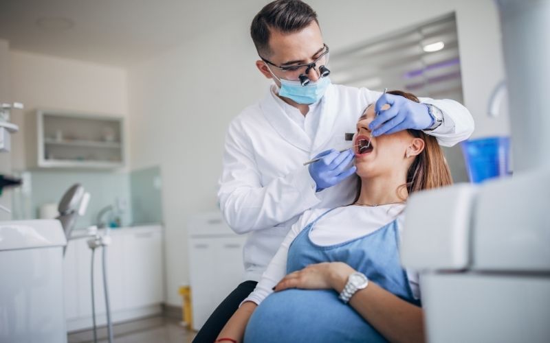 A-person-getting-their-teeth-checked-by-a-turkish-dentist